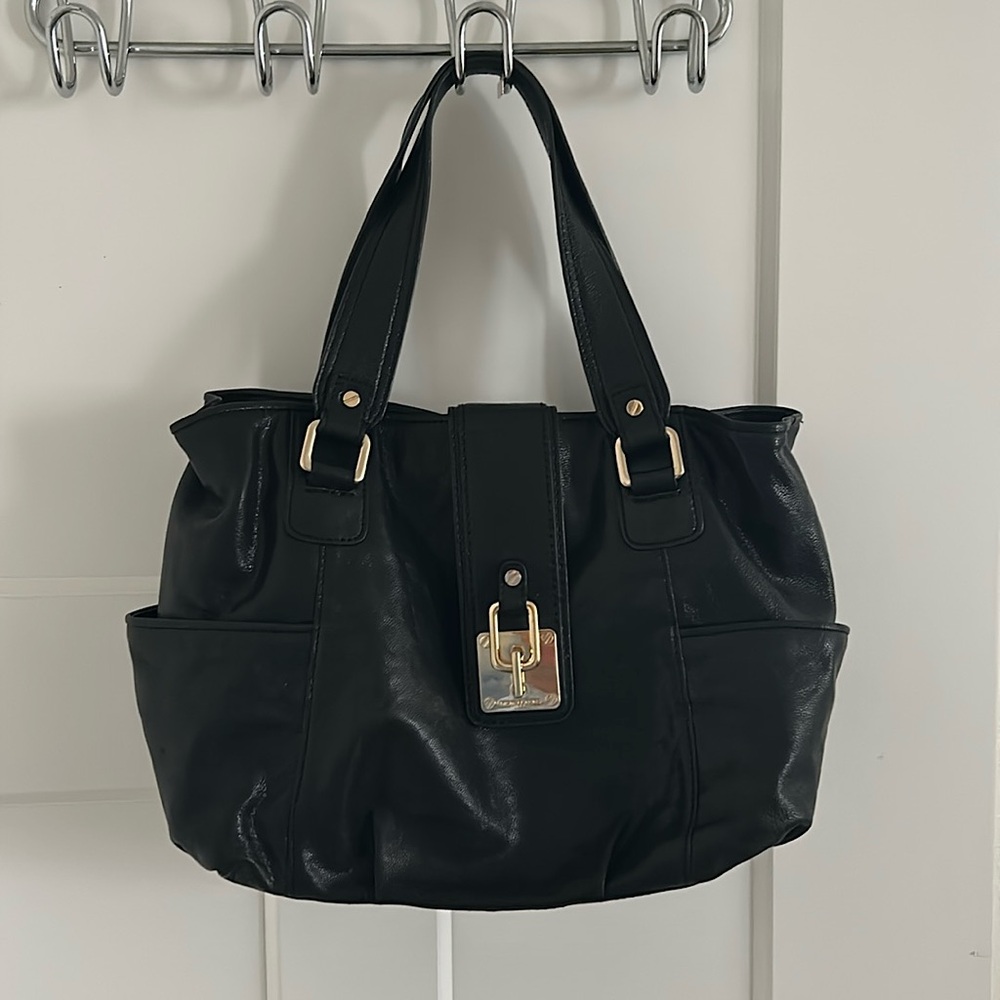 Black and gold Micheal Kors bag
